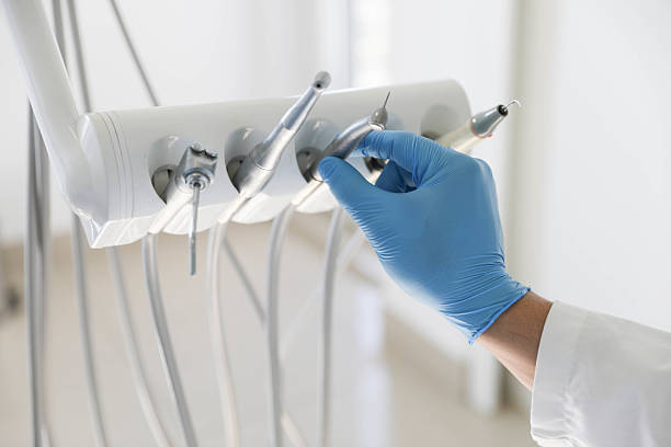 Professional Dental Implants technician working in Three Oaks, FL